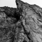 gray scale photo of rock formation