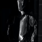 grayscale photography of armor