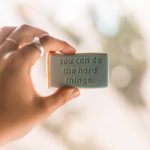 person holding happy birthday card