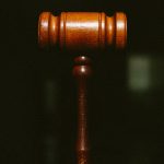 brown wooden pipe in dark room