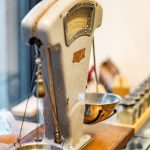 white and brown sewing machine