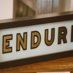 a close up of a sign on a table