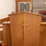 brown wooden cabinet with stainless steel handle