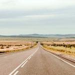 an empty road in the middle of nowhere