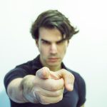 man pointing at camera