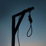 a black and white photo of a telephone pole