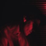 man in brown dress shirt